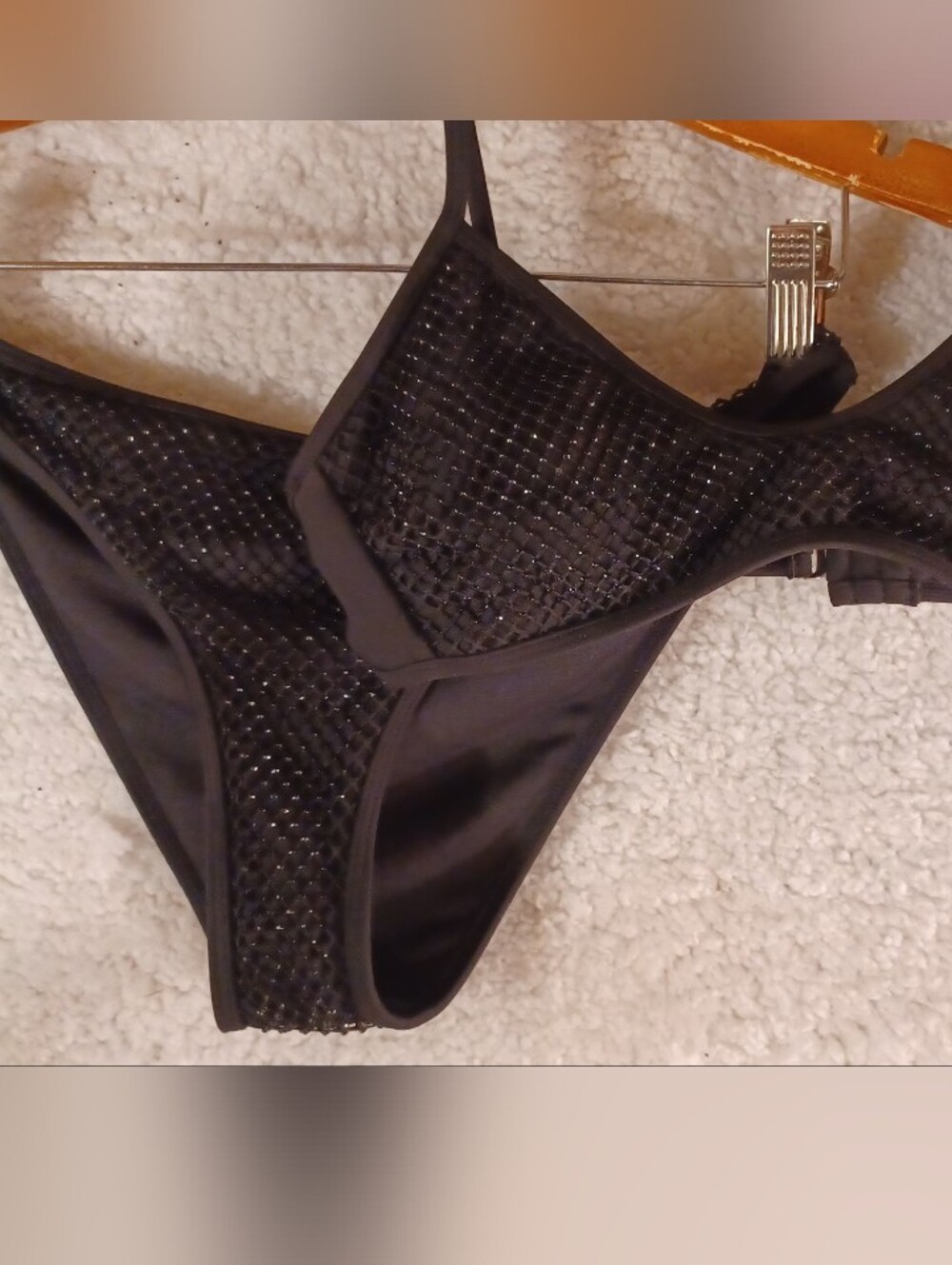 Two Sets Of Bathing Suits